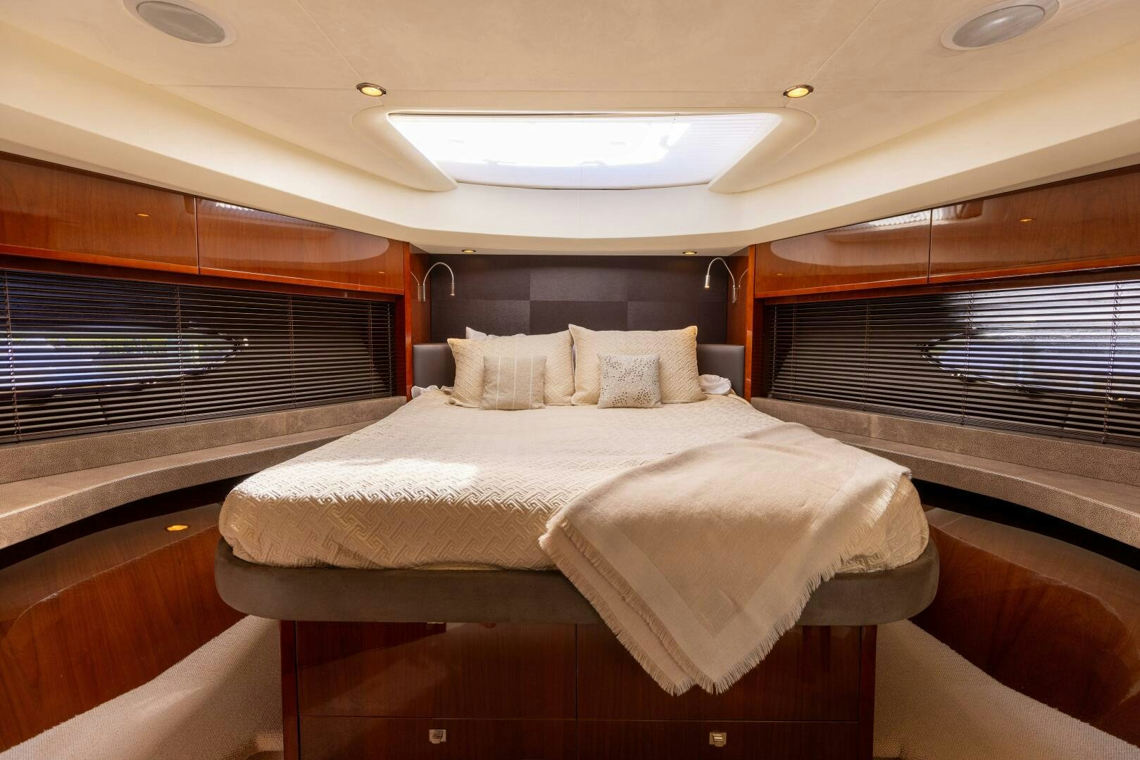 a room with a bed and a window aboard MISS DORI Yacht for Sale