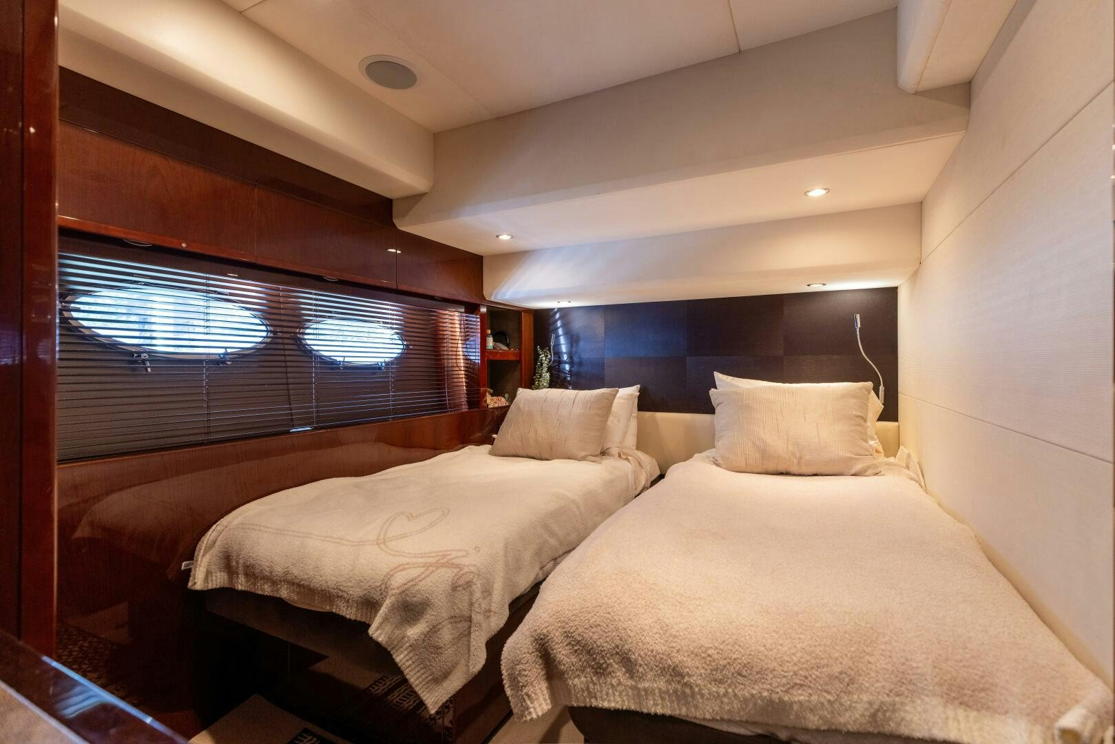 a room with two beds aboard MISS DORI Yacht for Sale