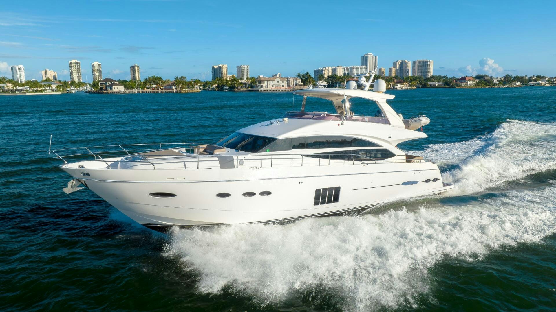 a white yacht on the water aboard MISS DORI Yacht for Sale