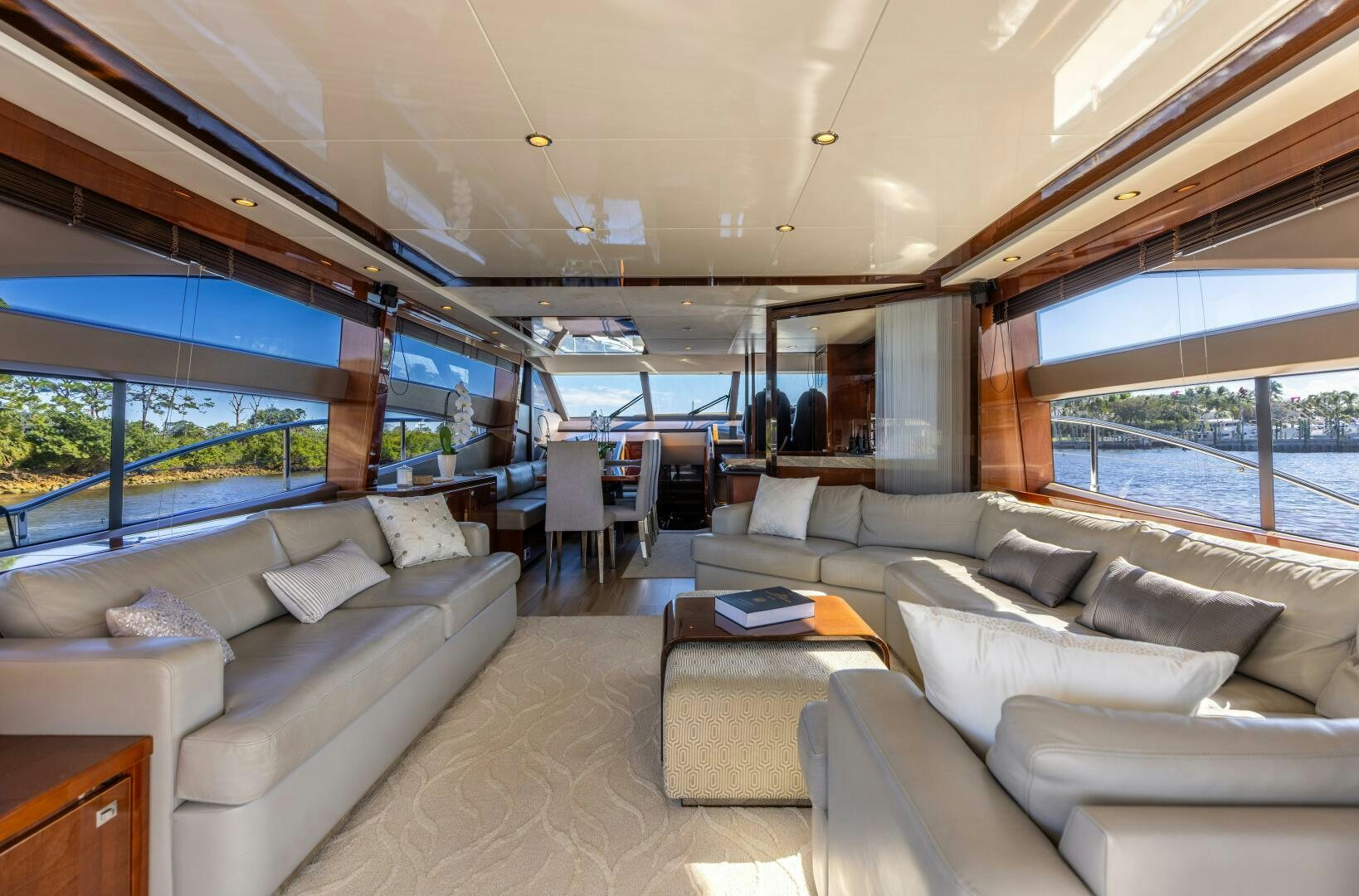 a living room with a large window aboard MISS DORI Yacht for Sale