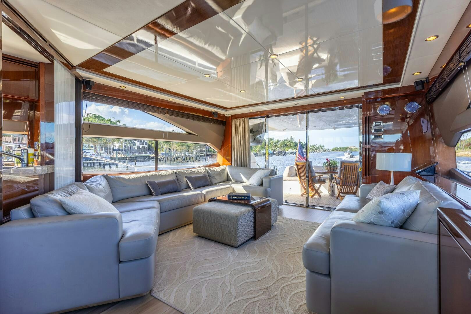 a living room with a large window aboard MISS DORI Yacht for Sale