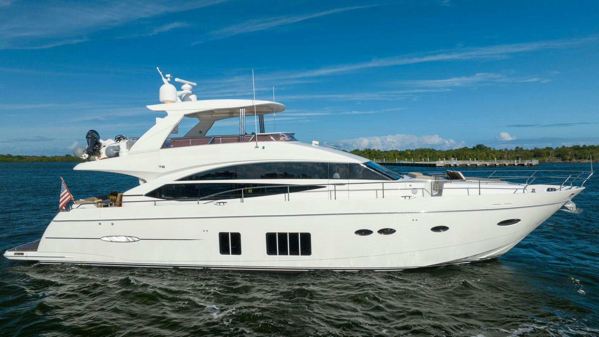 a white yacht in the water aboard MISS DORI Yacht for Sale