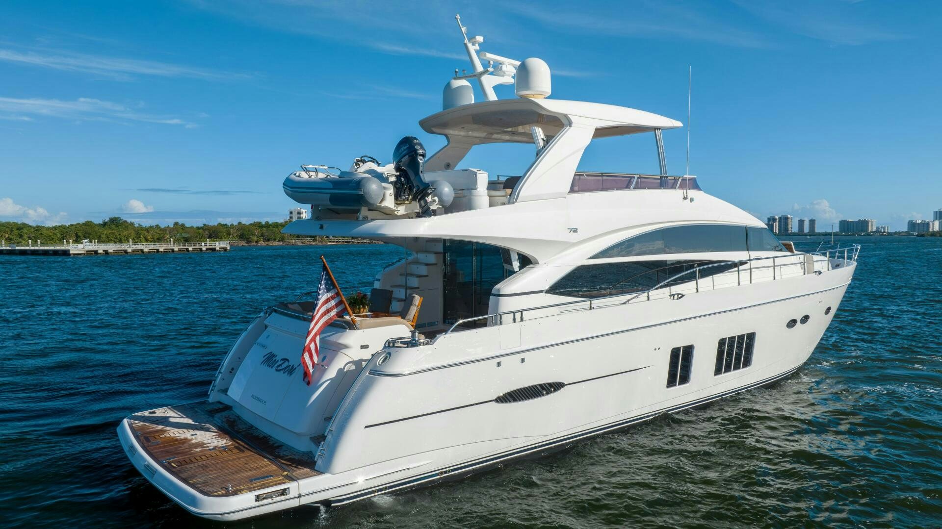 a boat on the water aboard MISS DORI Yacht for Sale