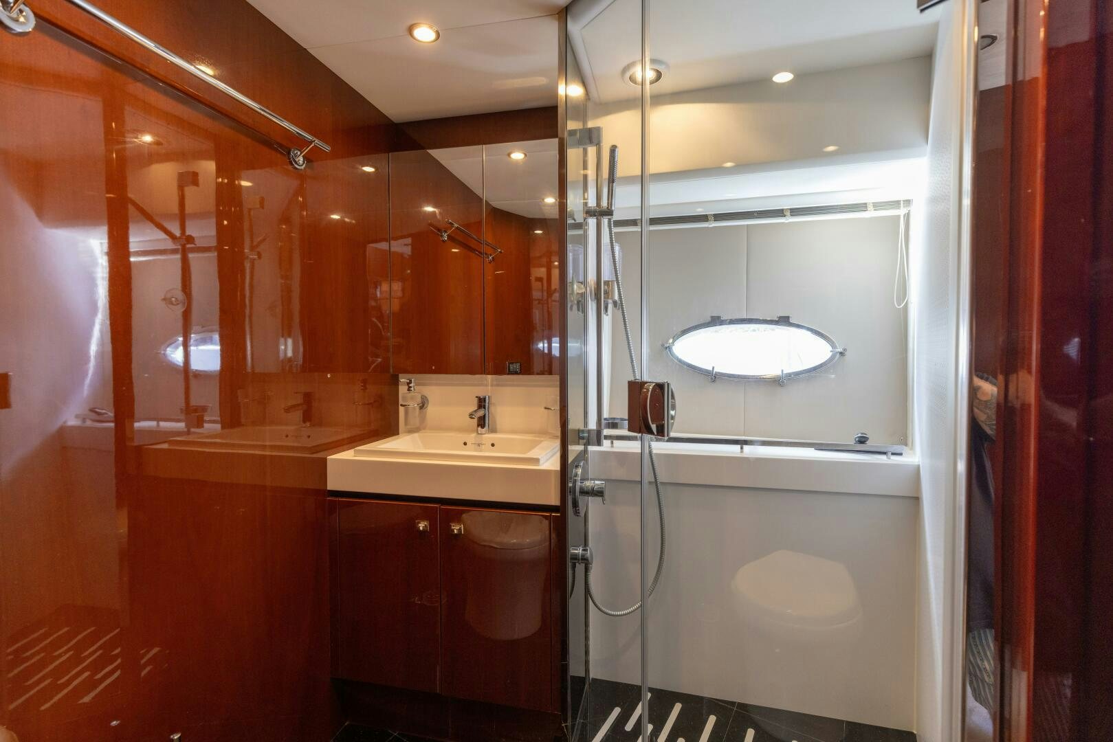a bathroom with a shower unit aboard MISS DORI Yacht for Sale