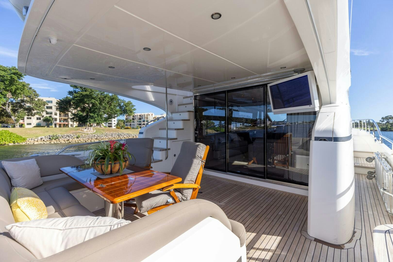 a living room with a large window aboard MISS DORI Yacht for Sale