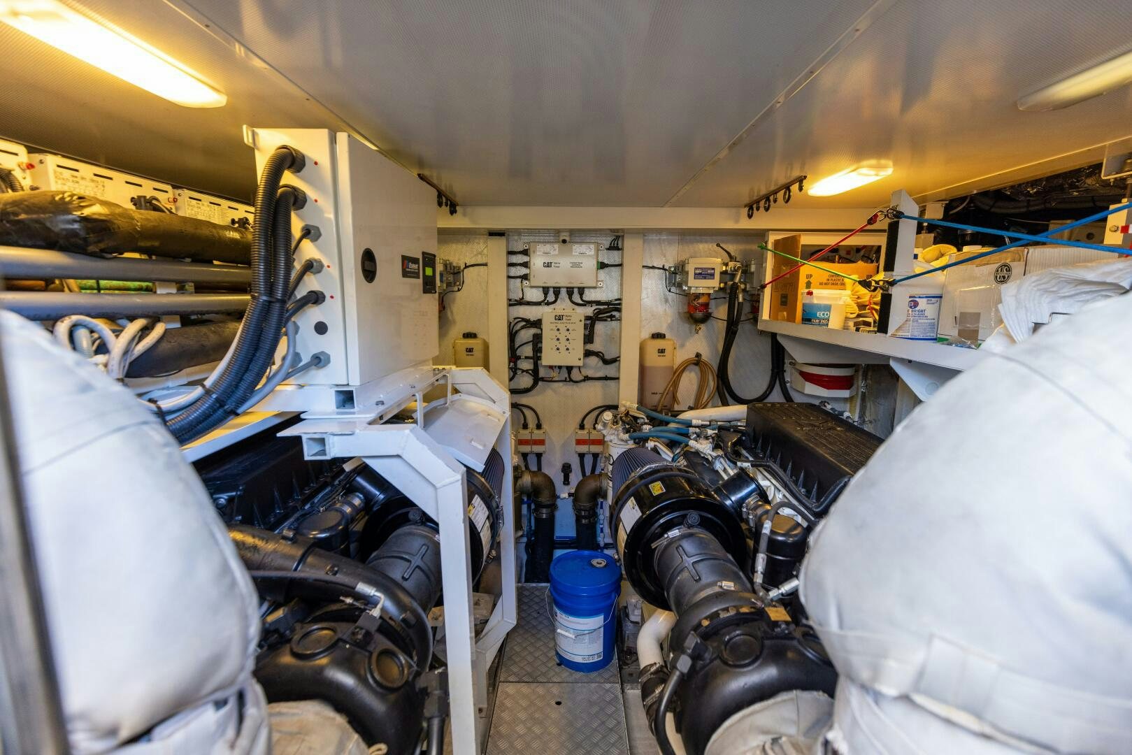 a room with a bed and a chair aboard MISS DORI Yacht for Sale