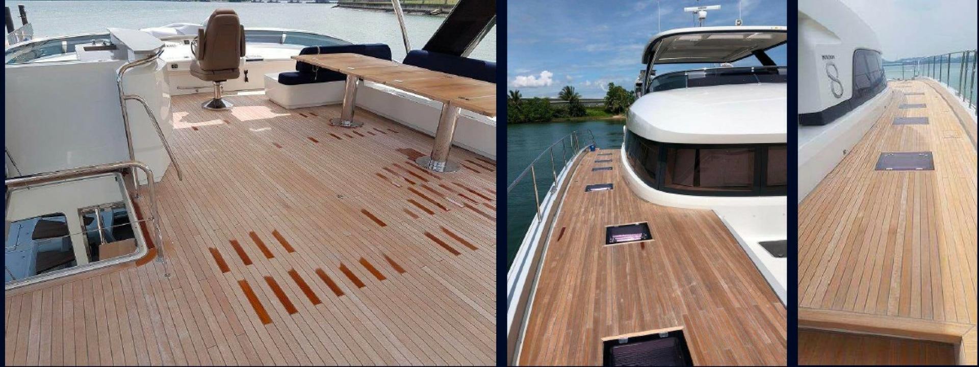 a deck with a boat and a chair on it aboard HTC Yacht for Sale
