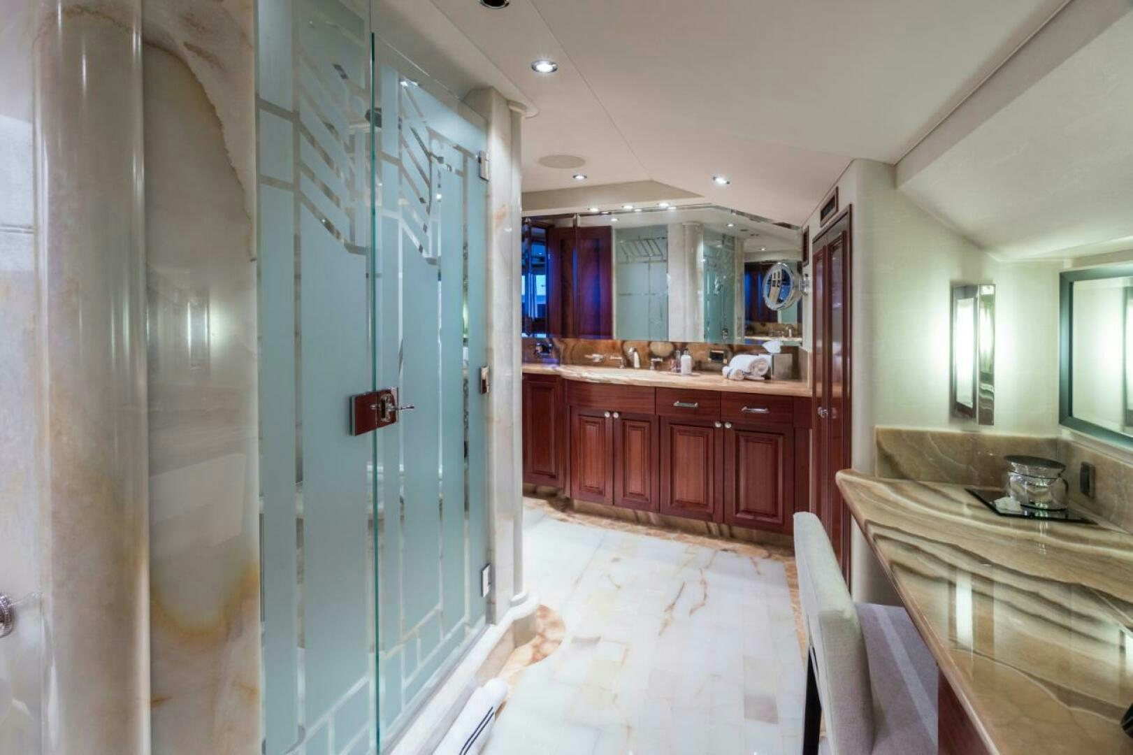 a kitchen with a countertop sink and cabinets aboard TRUST FUN Yacht for Sale