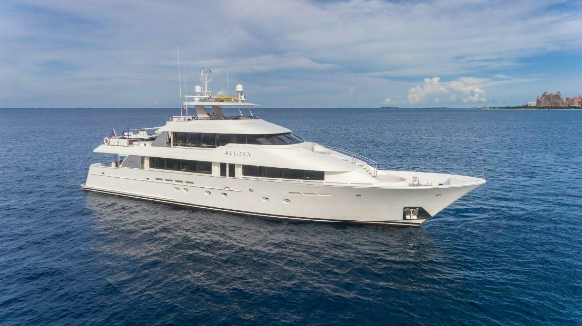 a white yacht in the water aboard TRUST FUN Yacht for Sale