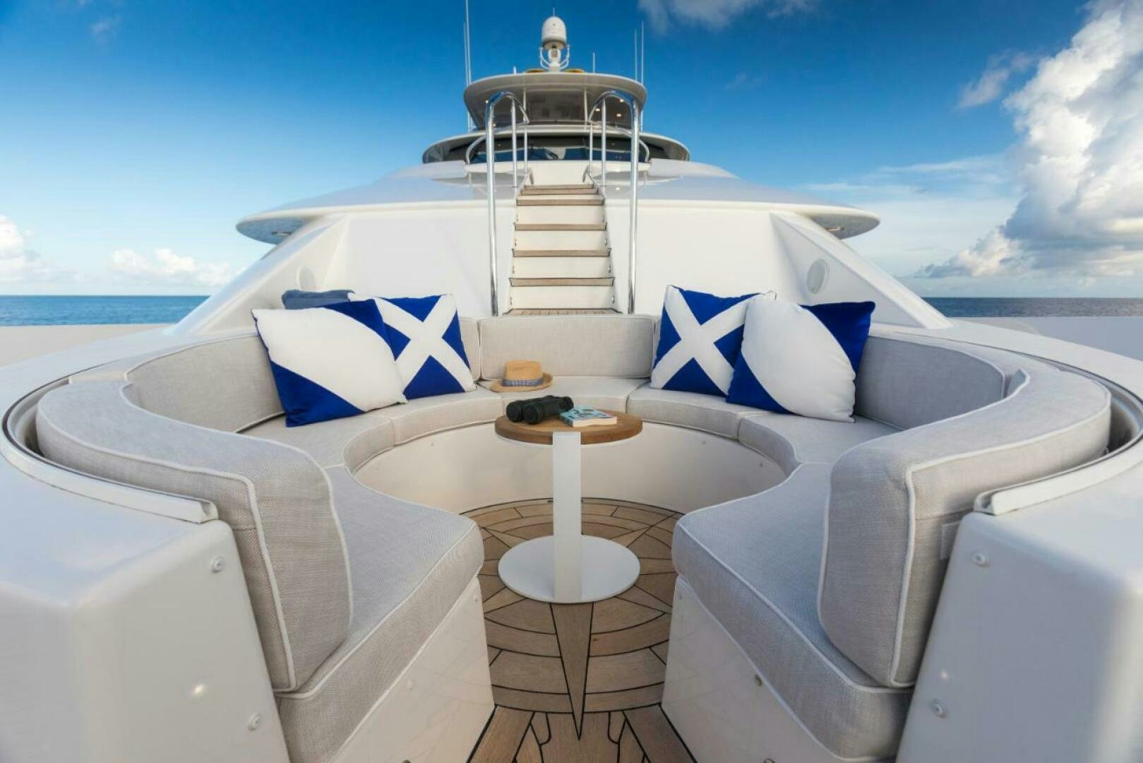 a boat with a flag on the front aboard TRUST FUN Yacht for Sale