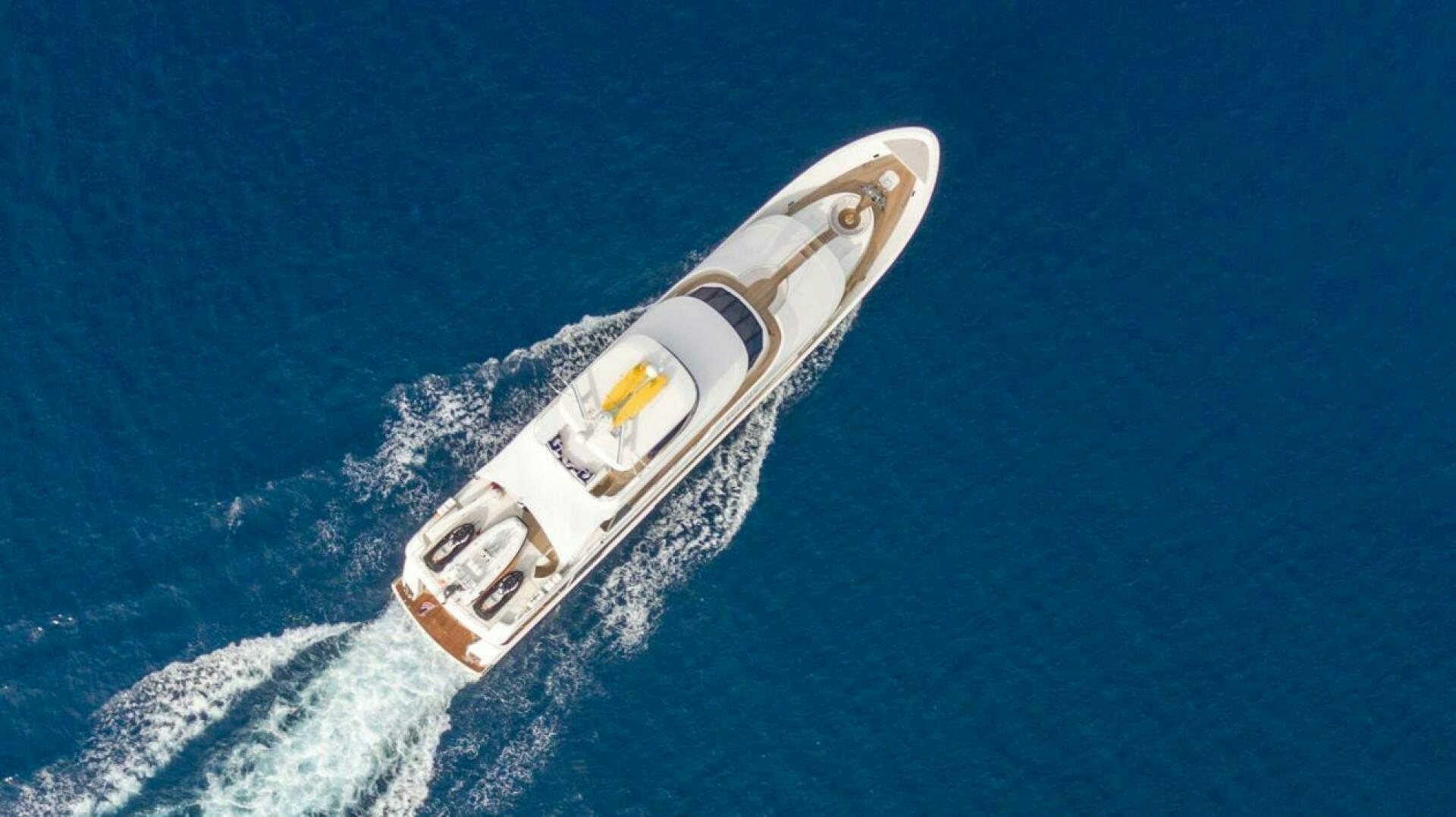 a space shuttle flying over the earth aboard TRUST FUN Yacht for Sale