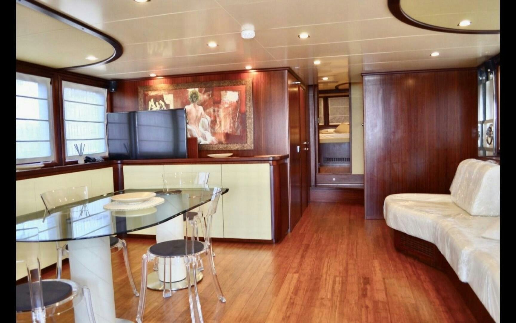 a room with a bed and a desk aboard MARILOAN FELNIC II Yacht for Sale