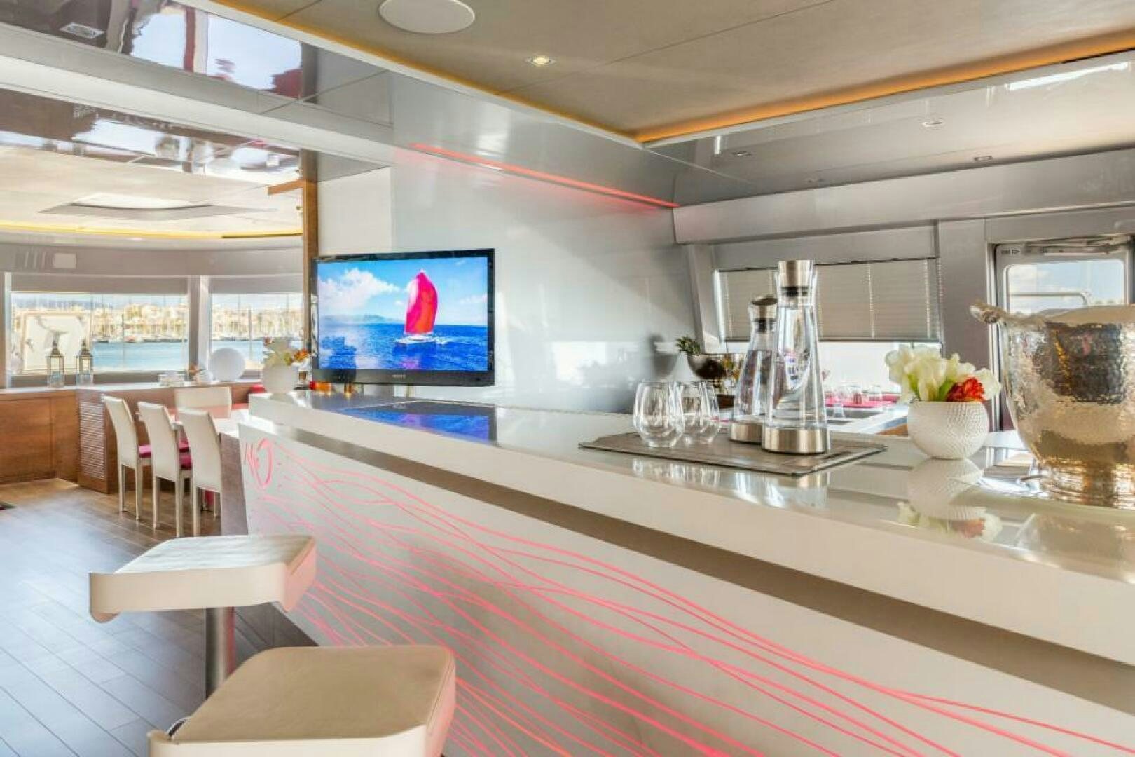 a large kitchen with a large tv aboard MOUSETRAP Yacht for Sale