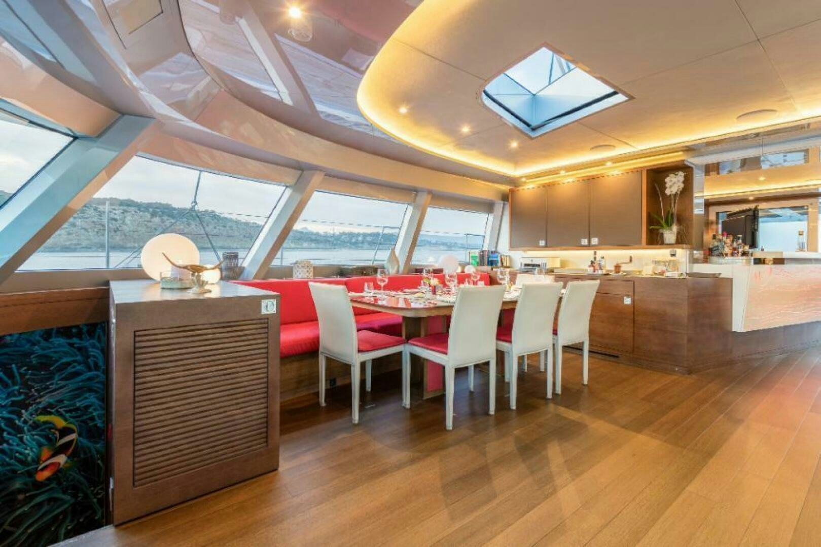 a room with tables and chairs aboard MOUSETRAP Yacht for Sale