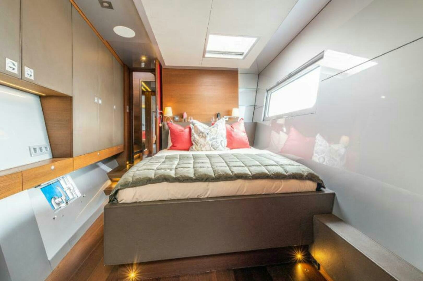 a bedroom with a bed aboard MOUSETRAP Yacht for Sale