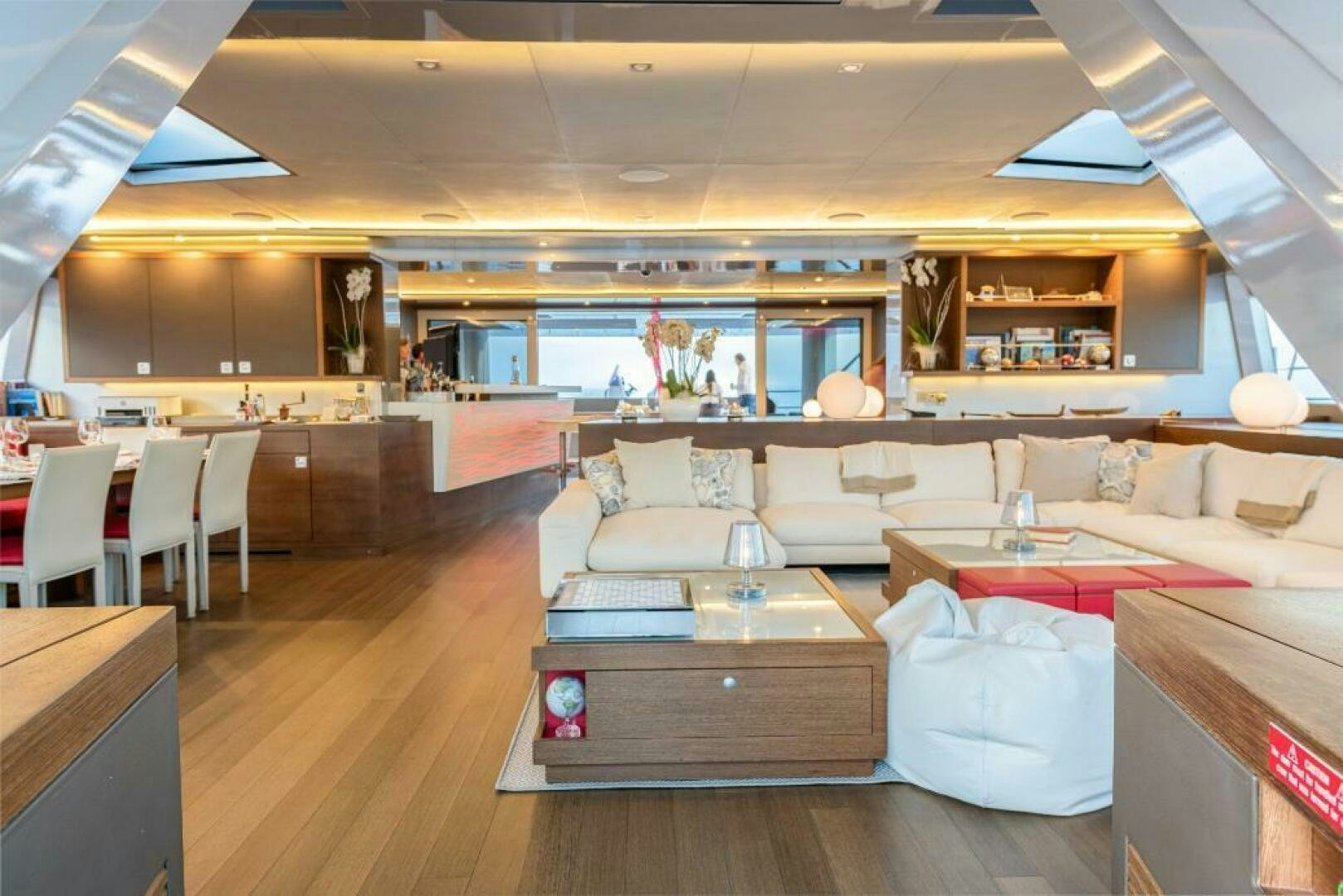 a room with a couch and a table aboard MOUSETRAP Yacht for Sale