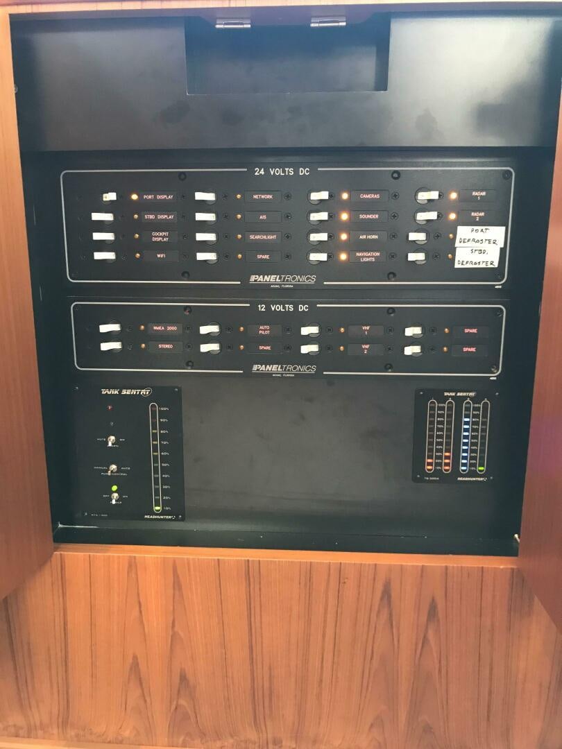 a black rectangular electronic device aboard PRIVATEER Yacht for Sale