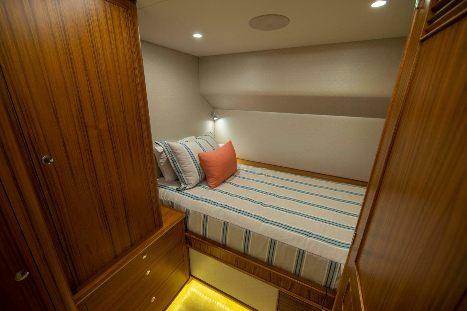 a bed in a room aboard PRIVATEER Yacht for Sale