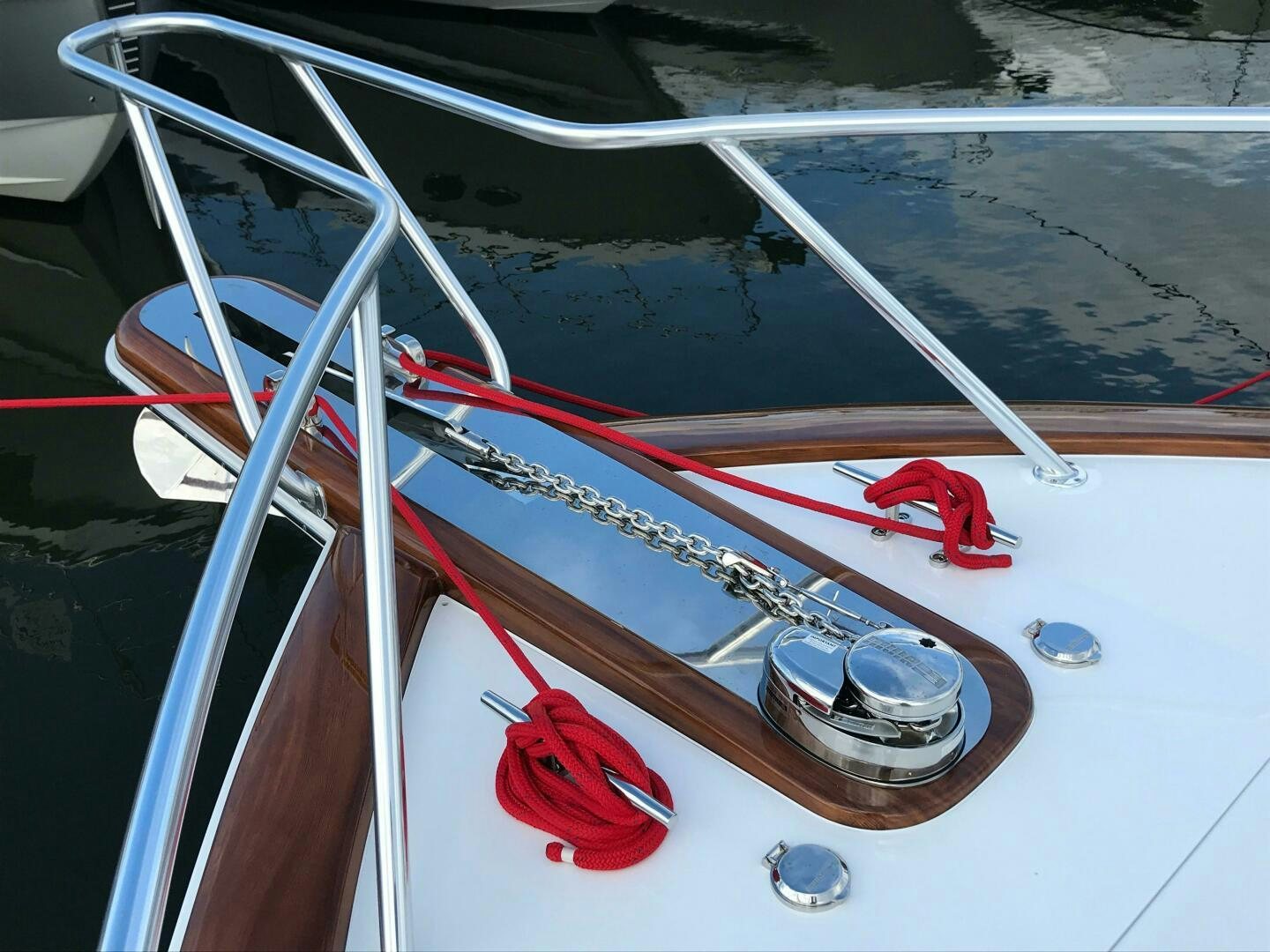 a boat with a red steering wheel aboard PRIVATEER Yacht for Sale