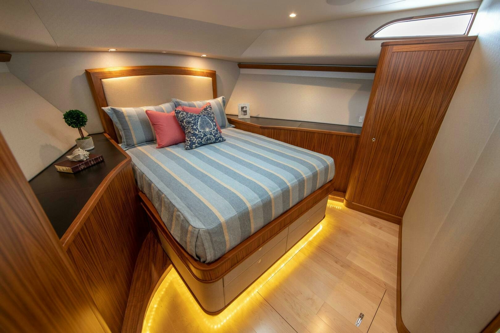 a bed in a room aboard PRIVATEER Yacht for Sale