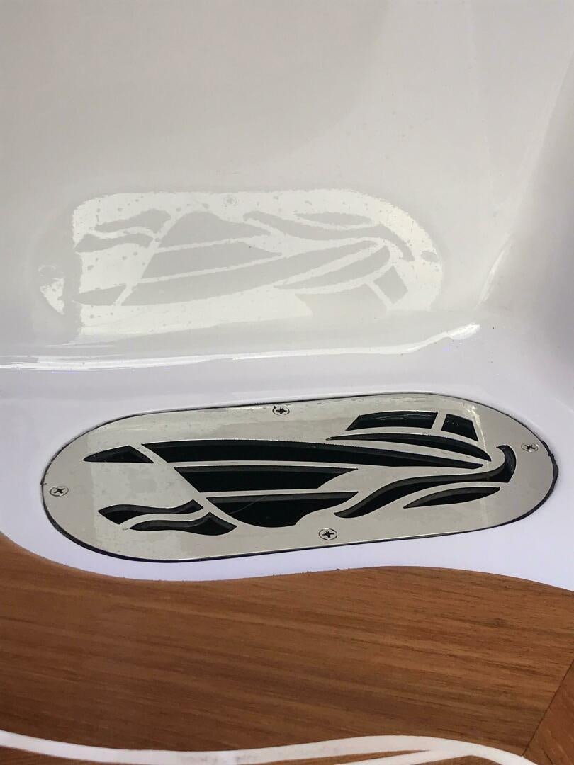 a white plate with a design on it aboard PRIVATEER Yacht for Sale