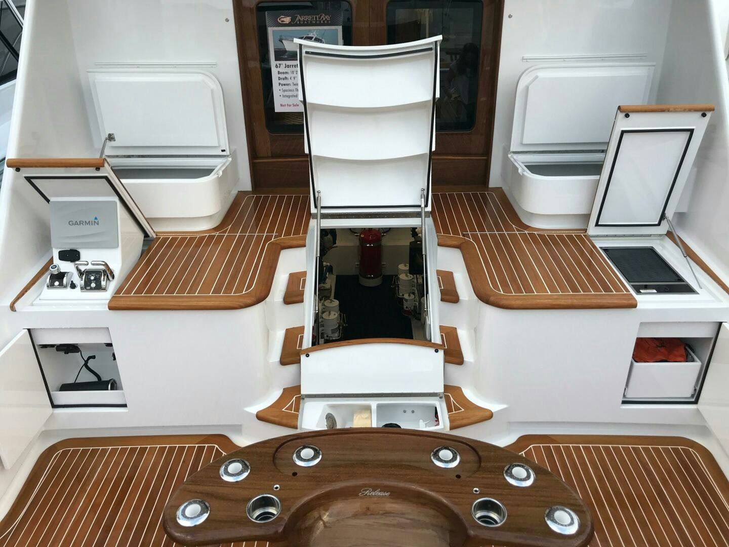 a white chair in a room aboard PRIVATEER Yacht for Sale