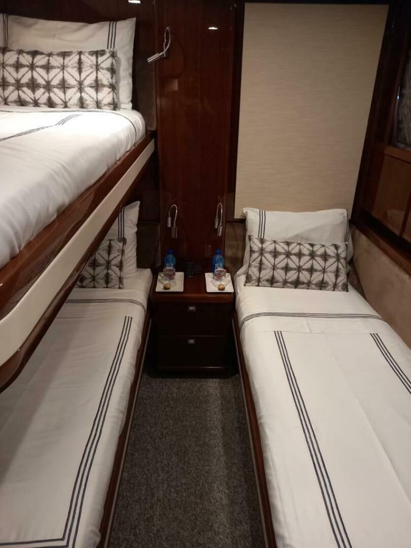 a room with two beds aboard PRINCESS TWO Yacht for Sale