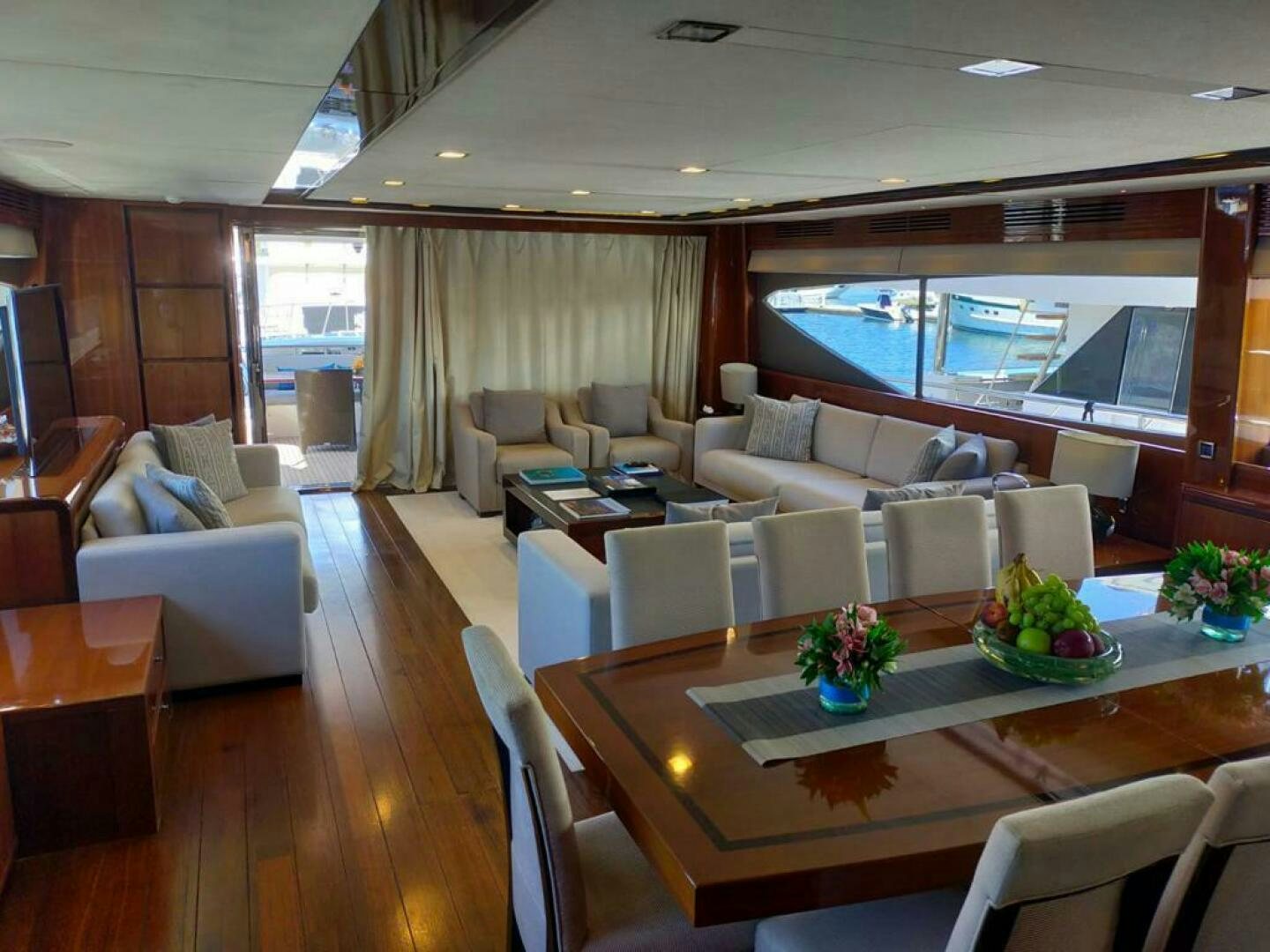 a living room with a table and chairs aboard PRINCESS TWO Yacht for Sale