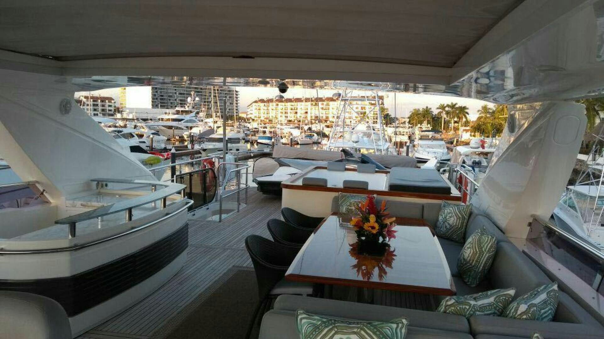a room with a table and chairs aboard PRINCESS TWO Yacht for Sale