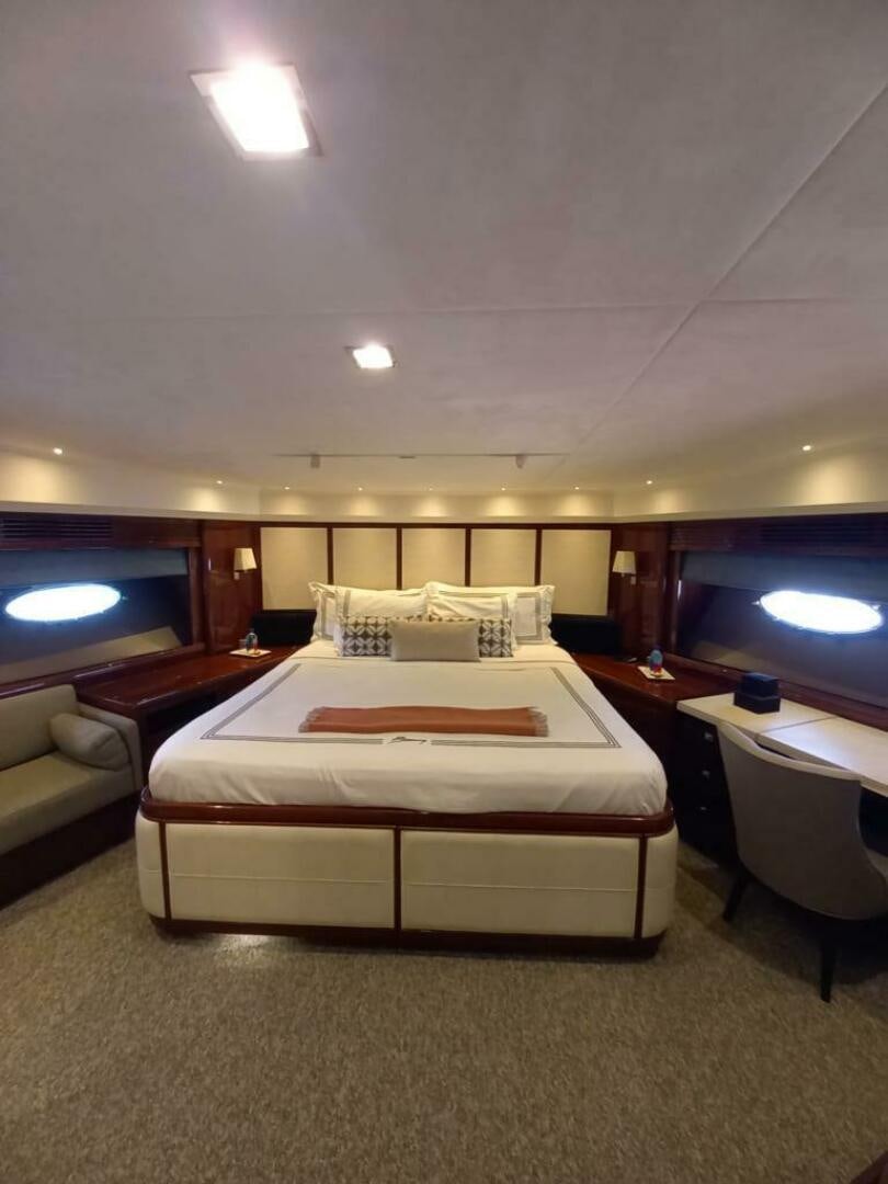 a hotel room with a bed aboard PRINCESS TWO Yacht for Sale