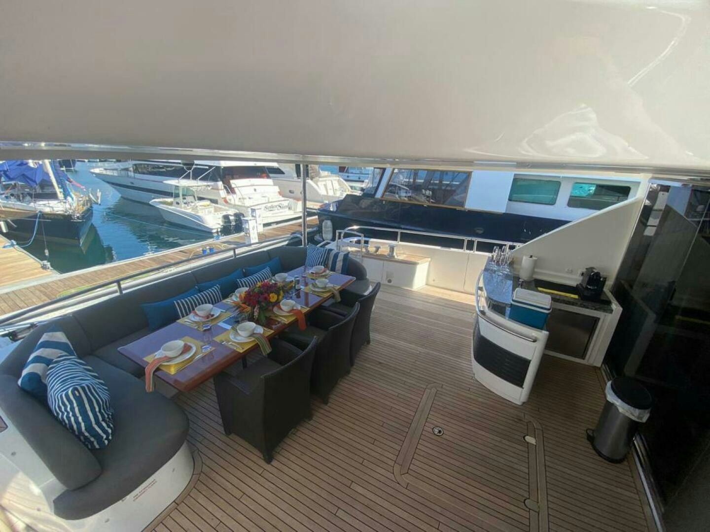 a room with a view of the water and the deck aboard PRINCESS TWO Yacht for Sale