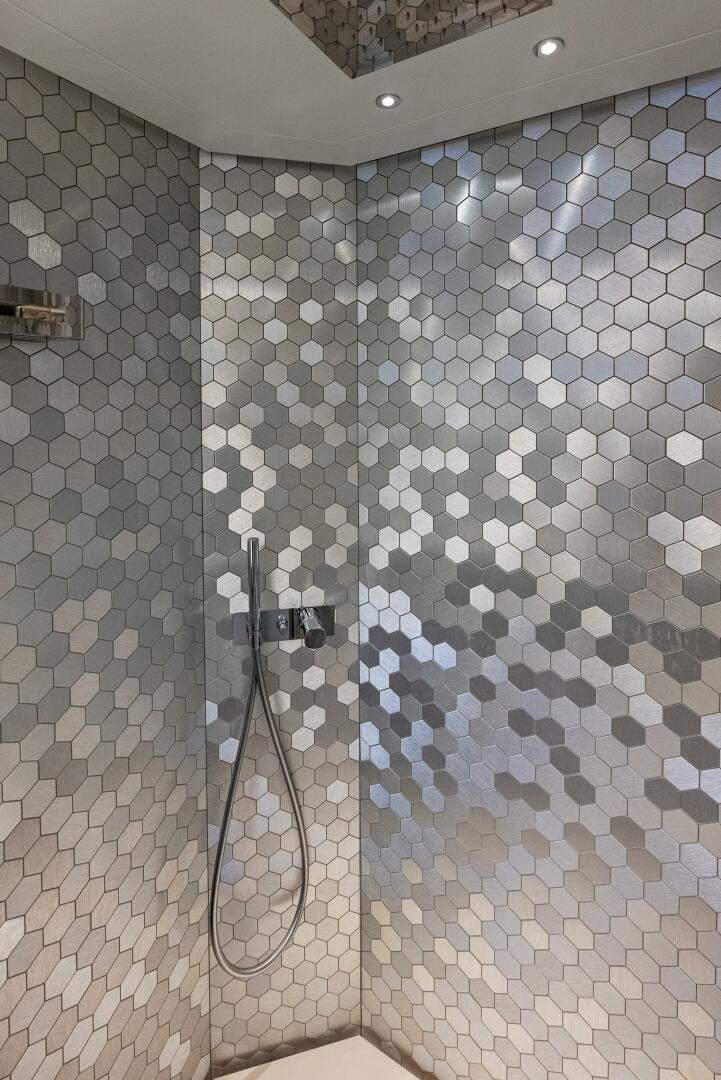 a white tiled wall aboard OUR TRADE Yacht for Sale