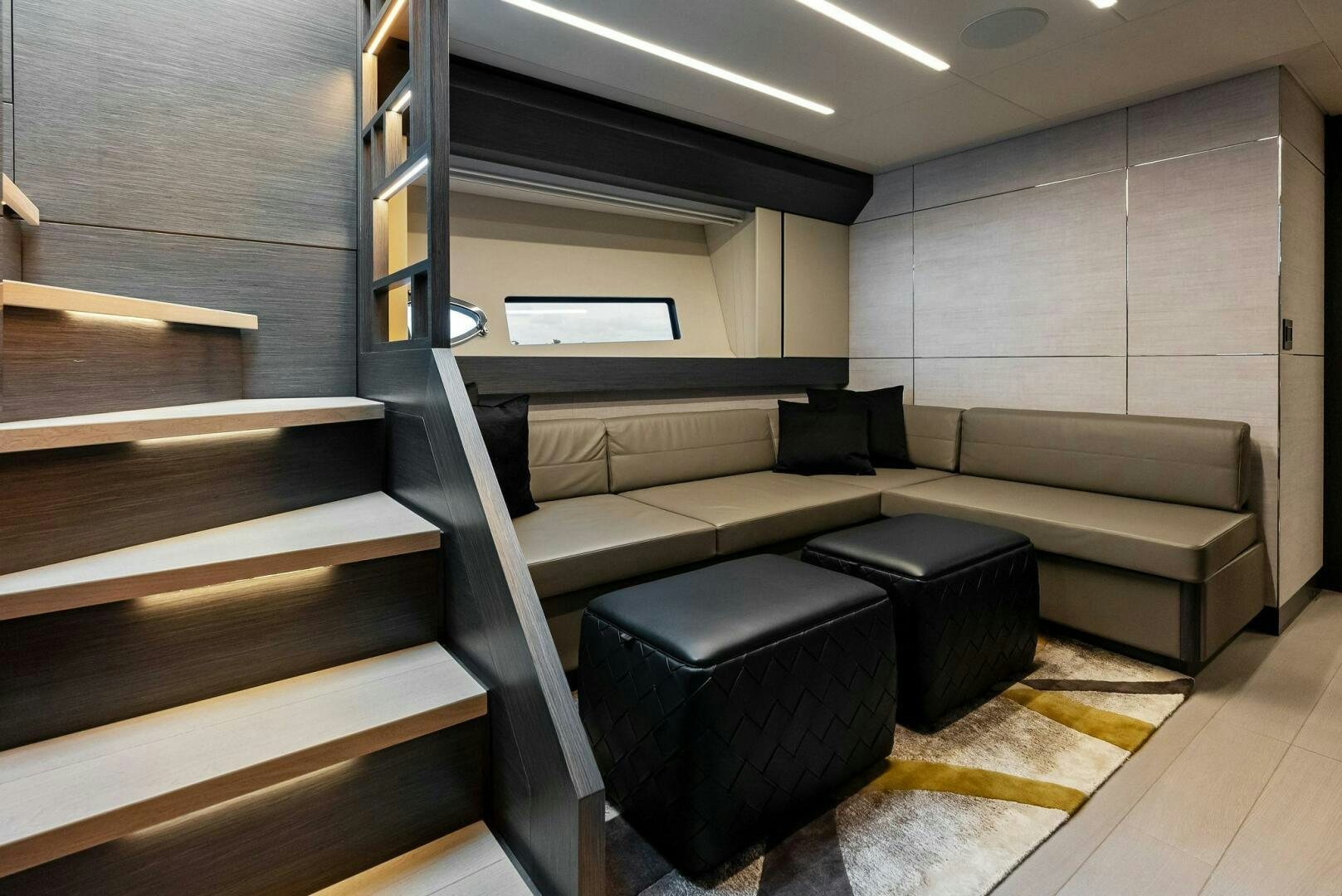 a room with a couch and a table aboard OUR TRADE Yacht for Sale