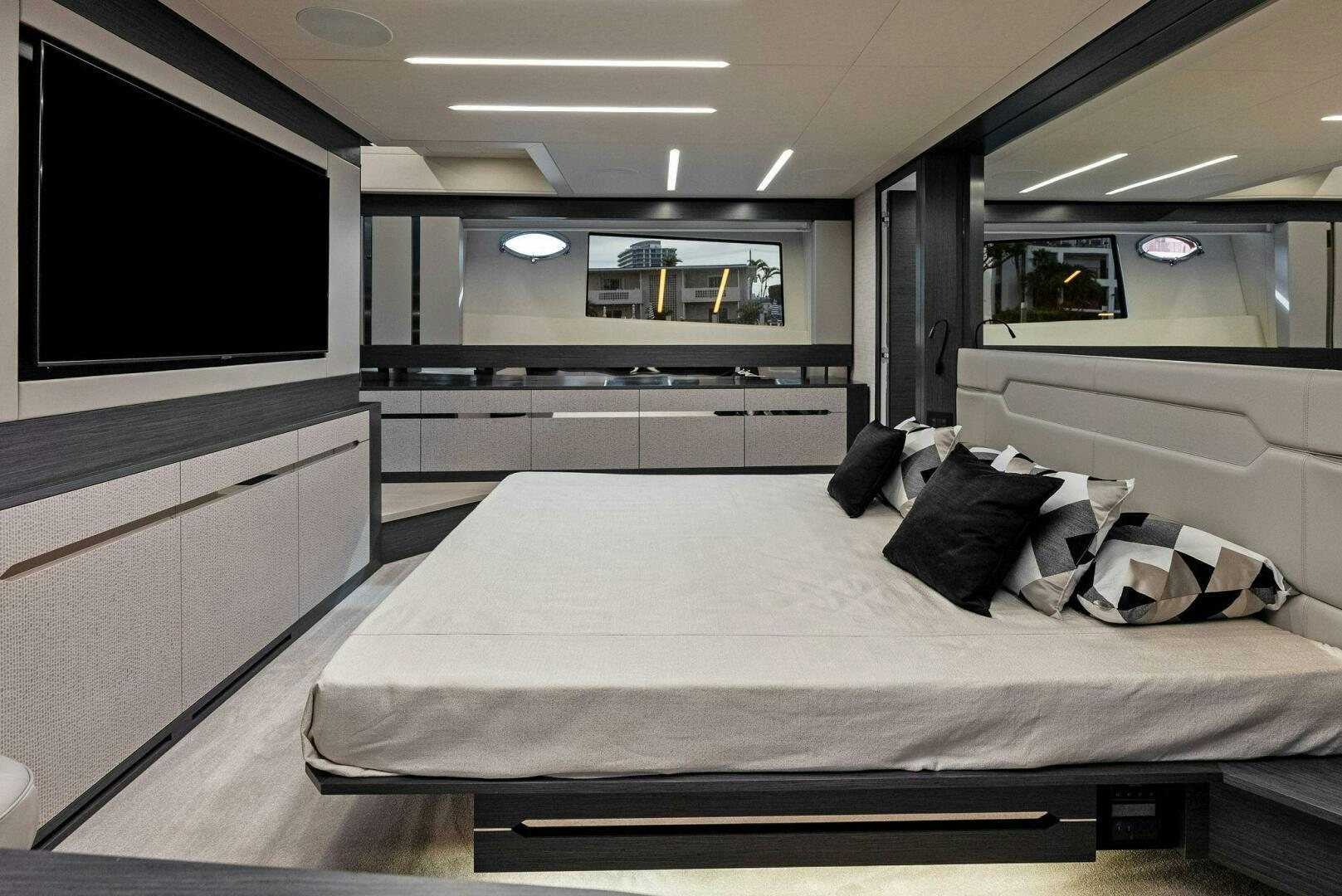 a bed in a room aboard OUR TRADE Yacht for Sale