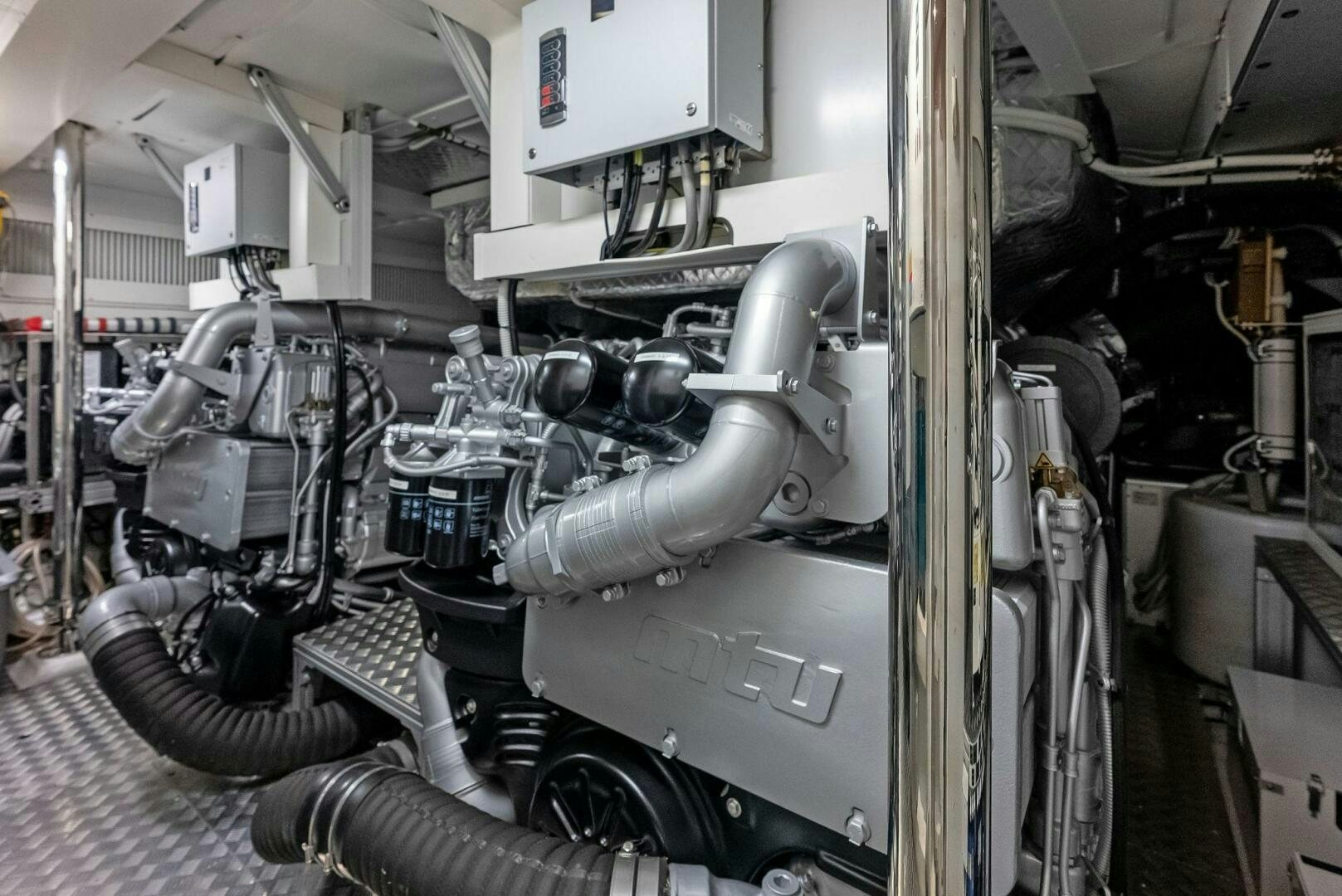 a machine with a large metal cylinder aboard OUR TRADE Yacht for Sale