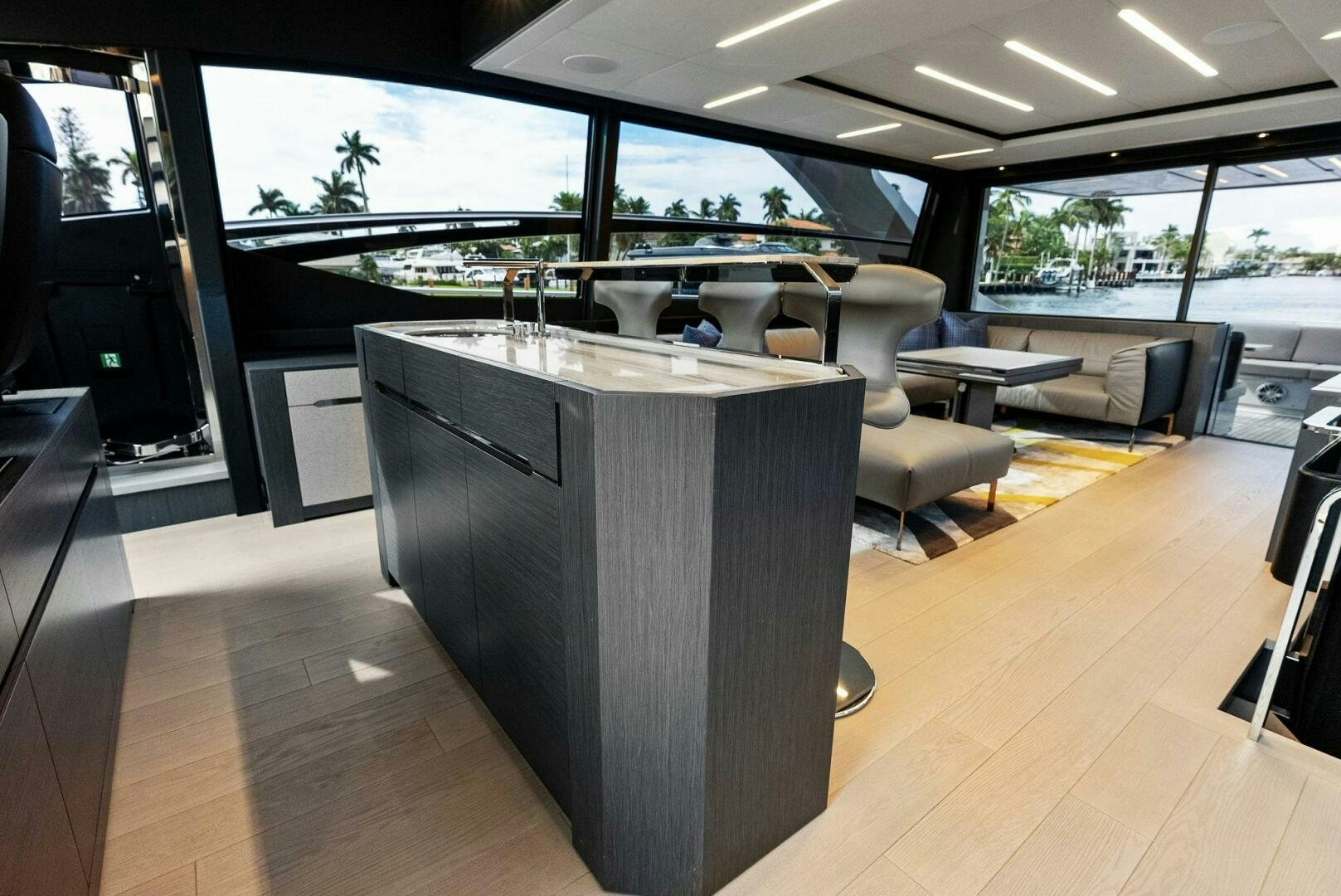 a large room with a table and chairs aboard OUR TRADE Yacht for Sale