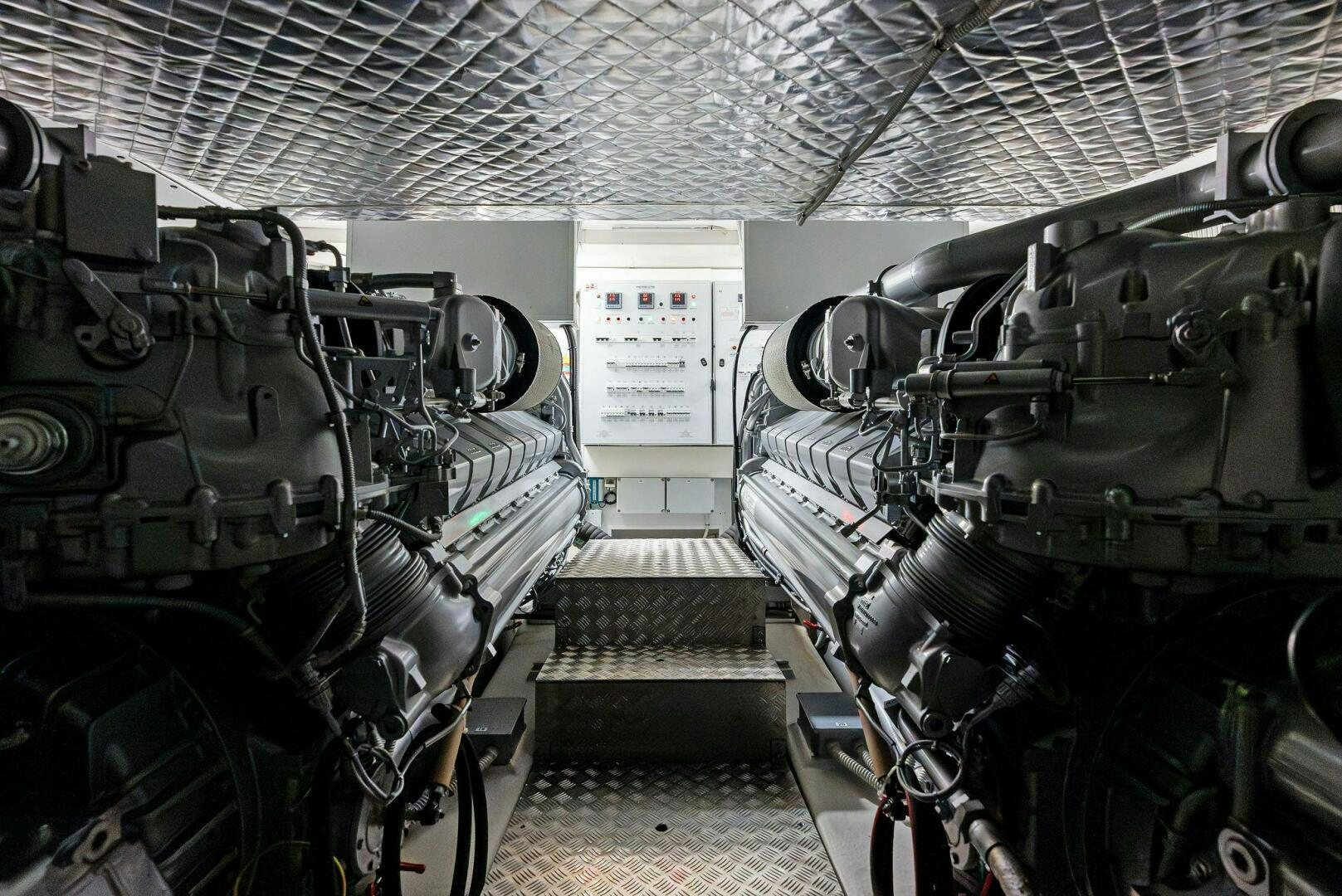 a large room with machinery aboard OUR TRADE Yacht for Sale