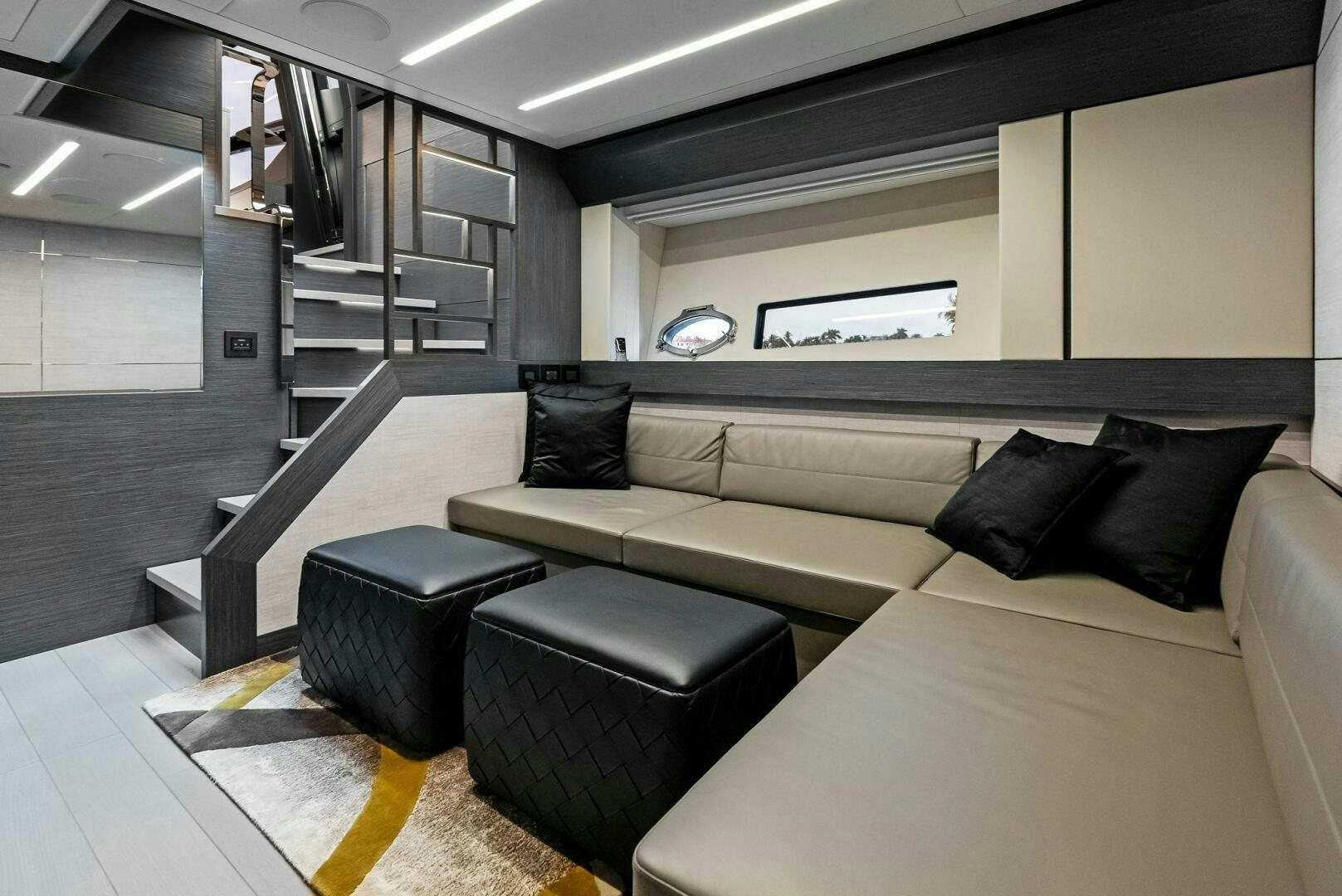a room with a couch and a table aboard OUR TRADE Yacht for Sale