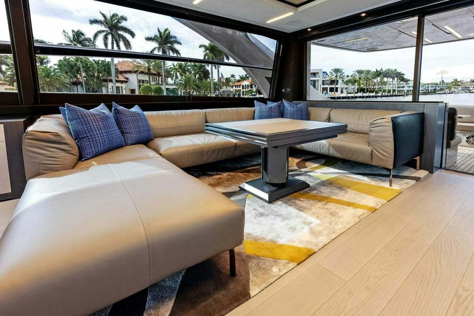 a room with couches and a table aboard OUR TRADE Yacht for Sale