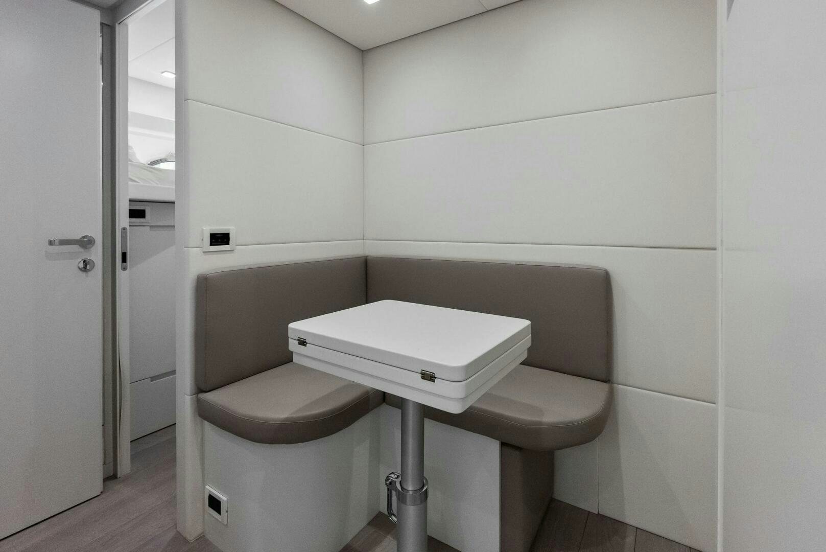 a toilet and sink in a bathroom aboard OUR TRADE Yacht for Sale