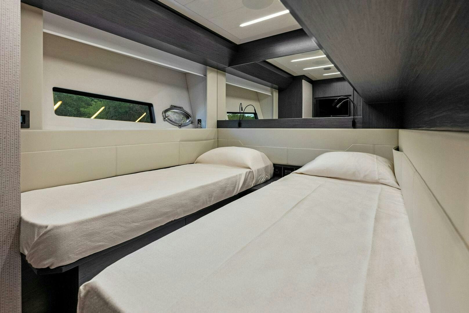 a room with two beds aboard OUR TRADE Yacht for Sale
