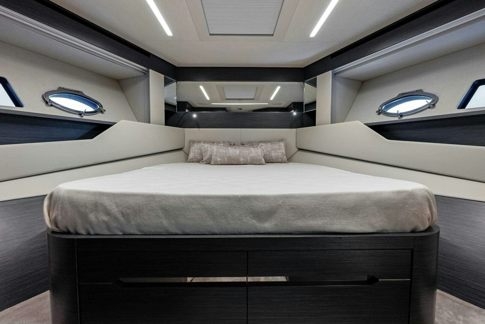 a bed in a room aboard OUR TRADE Yacht for Sale