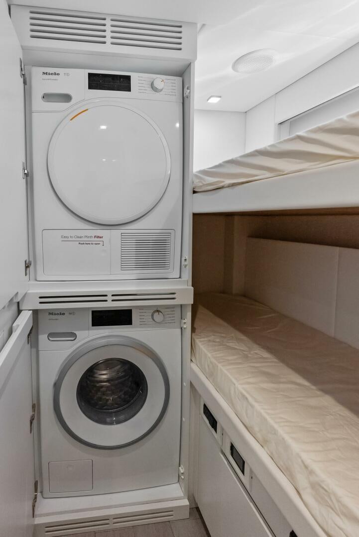 a white washing machine aboard OUR TRADE Yacht for Sale