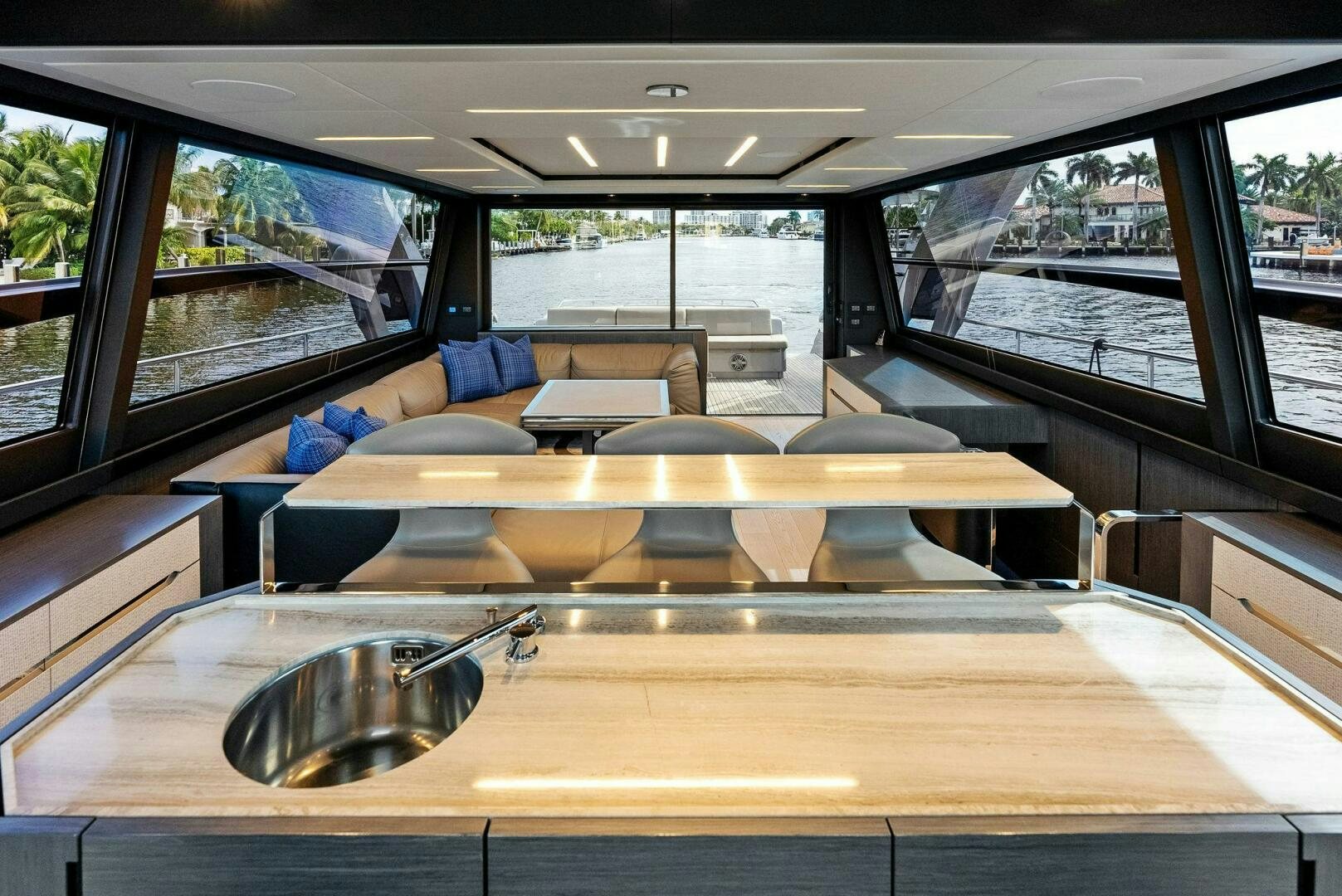 a large kitchen with a large table aboard OUR TRADE Yacht for Sale