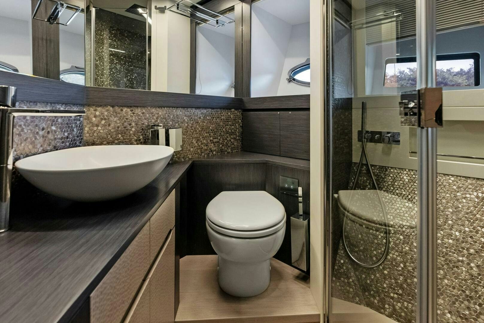 a bathroom with a sink and toilet aboard OUR TRADE Yacht for Sale
