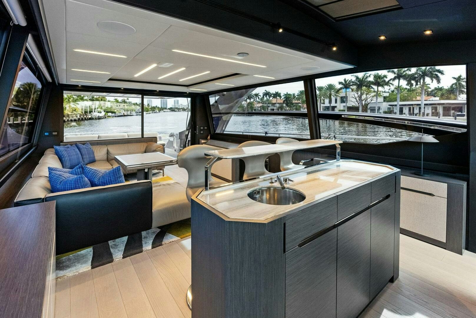 a kitchen with a large island aboard OUR TRADE Yacht for Sale