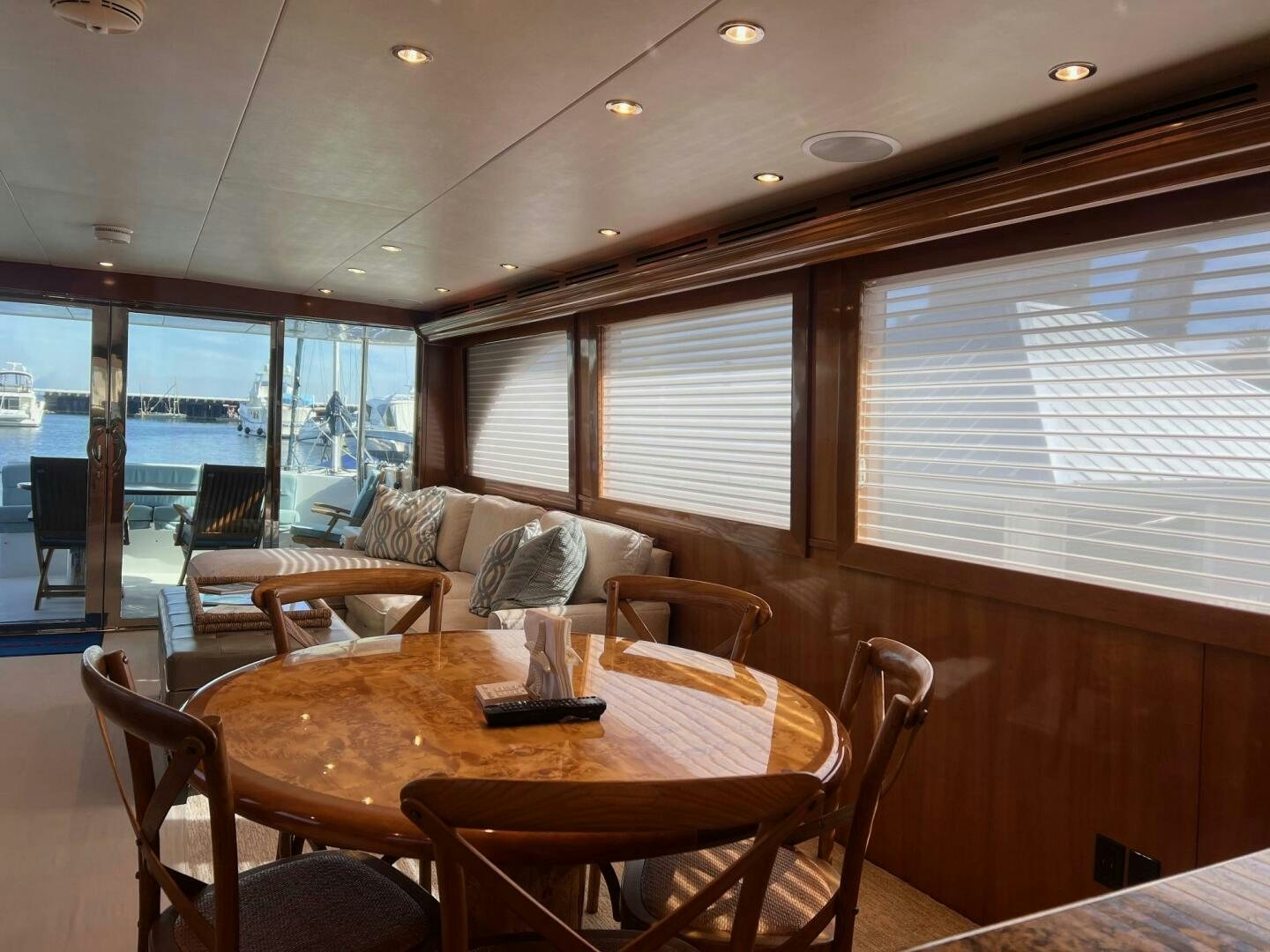 a room with a table and chairs aboard BAYOU A BUD Yacht for Sale
