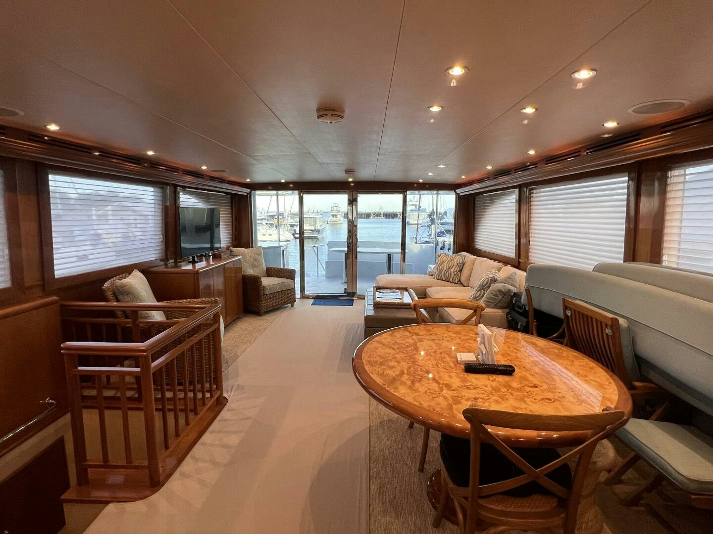 a living room with a table and chairs aboard BAYOU A BUD Yacht for Sale