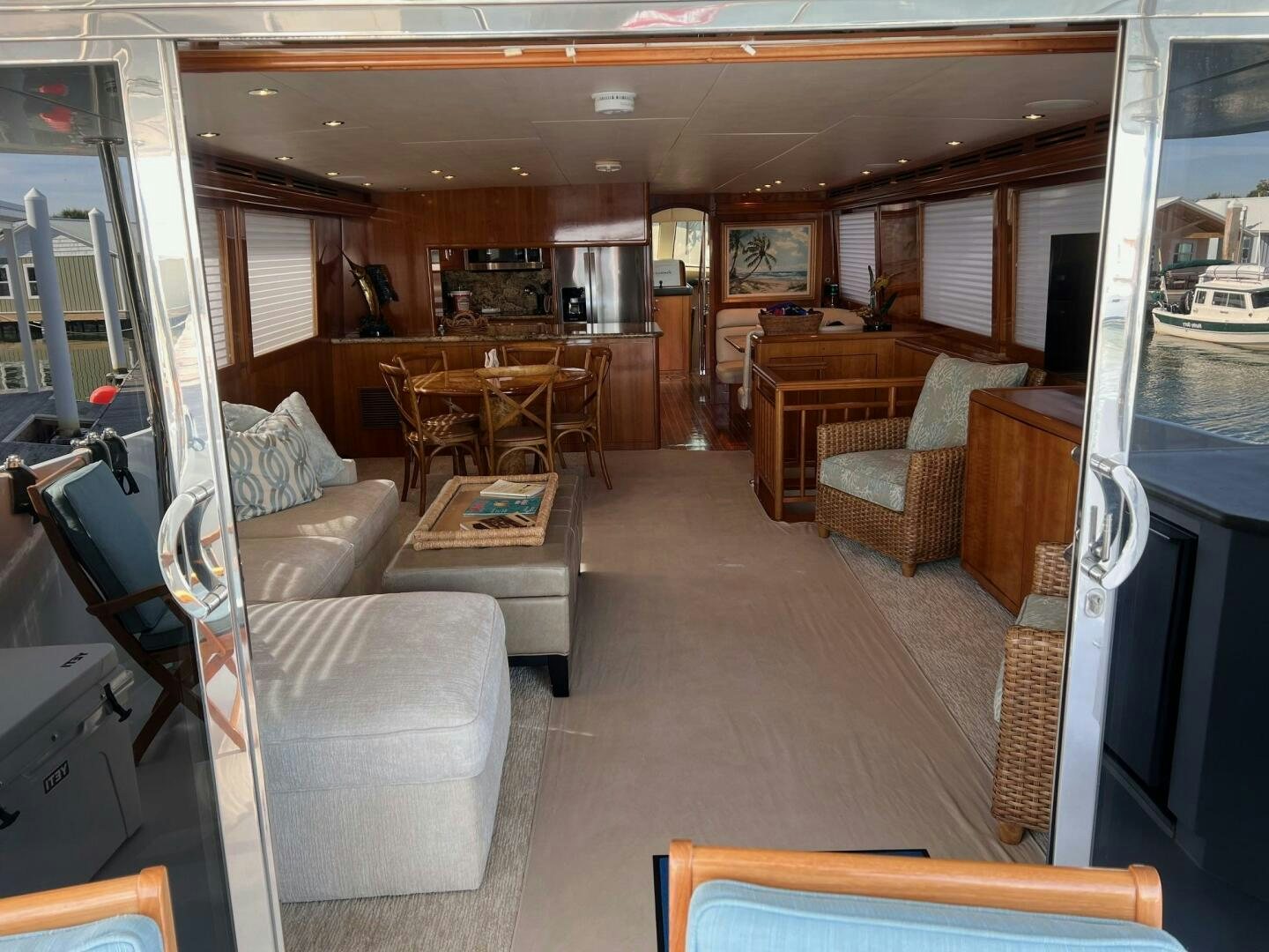 a living room with a couch and a coffee table aboard BAYOU A BUD Yacht for Sale
