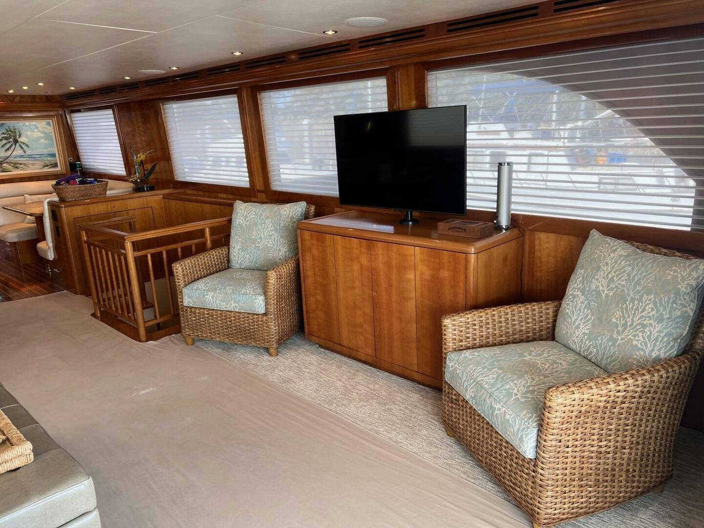 a living room with a tv and a couch aboard BAYOU A BUD Yacht for Sale